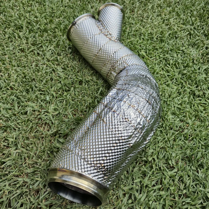 Finished exhaust thermal shield assembly showing the precision of the multi-layer insulation wrapping.